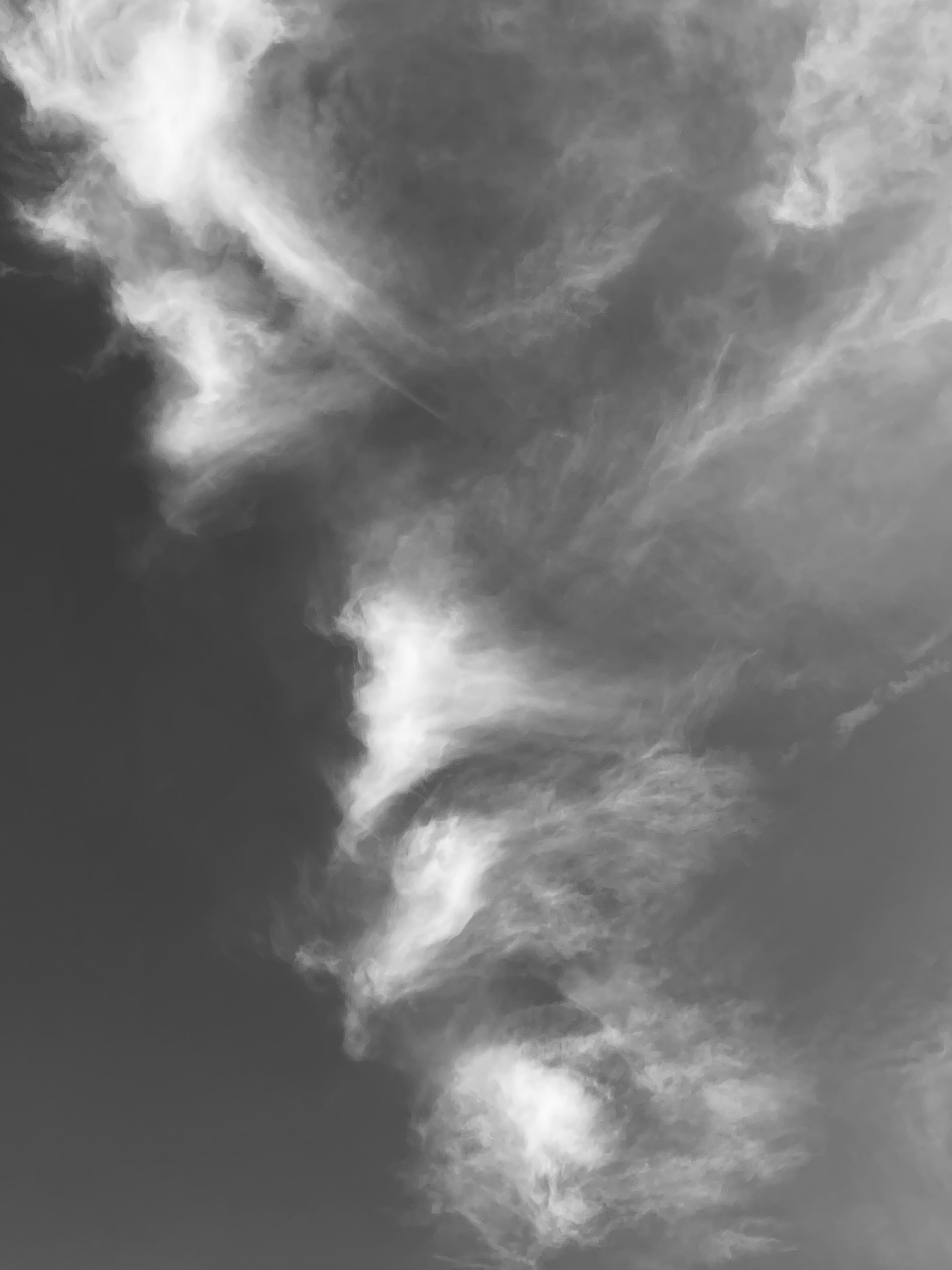 smoke or clouds and face of a man