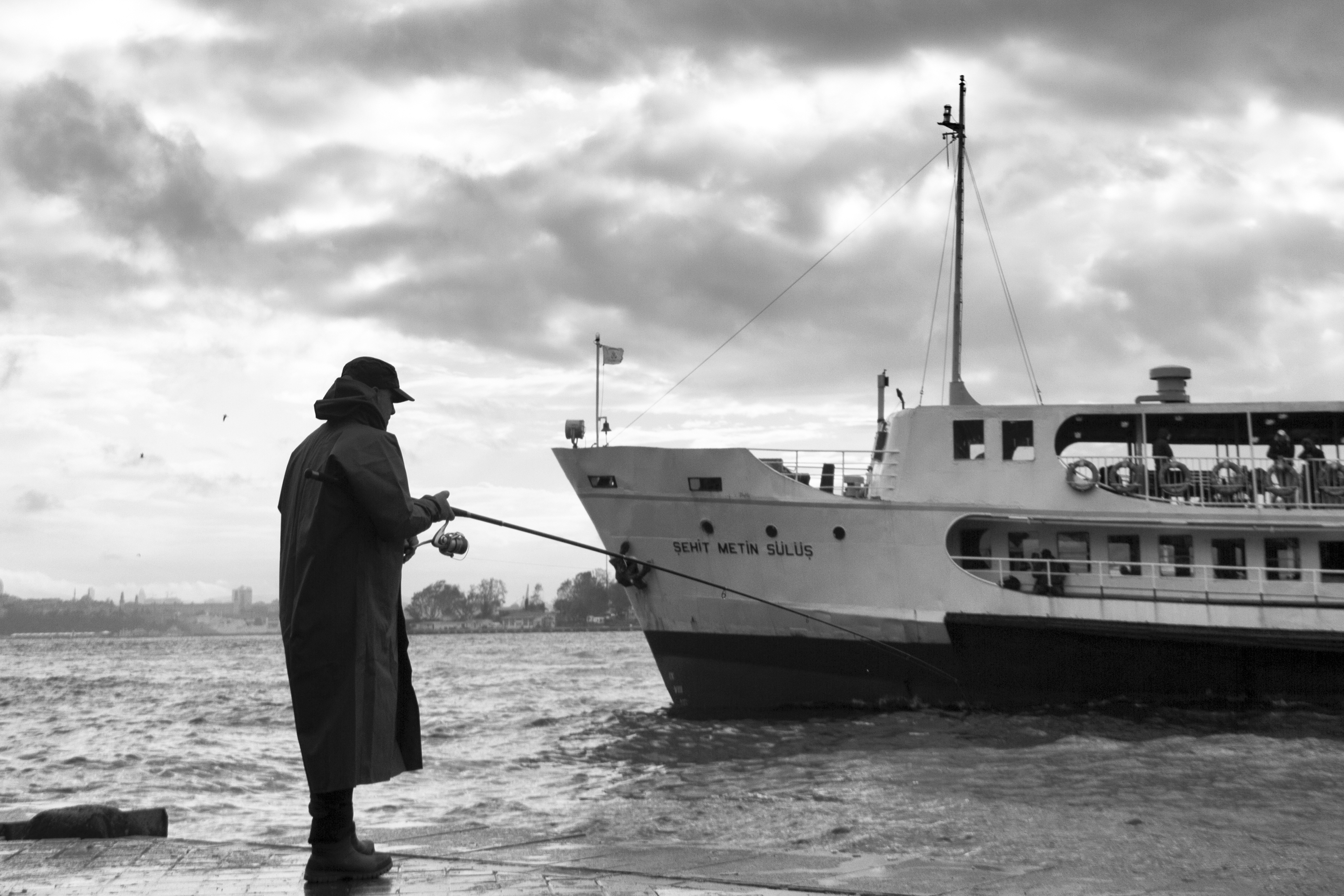Fisherman fishing in the Golden Horn of Istanbul #1