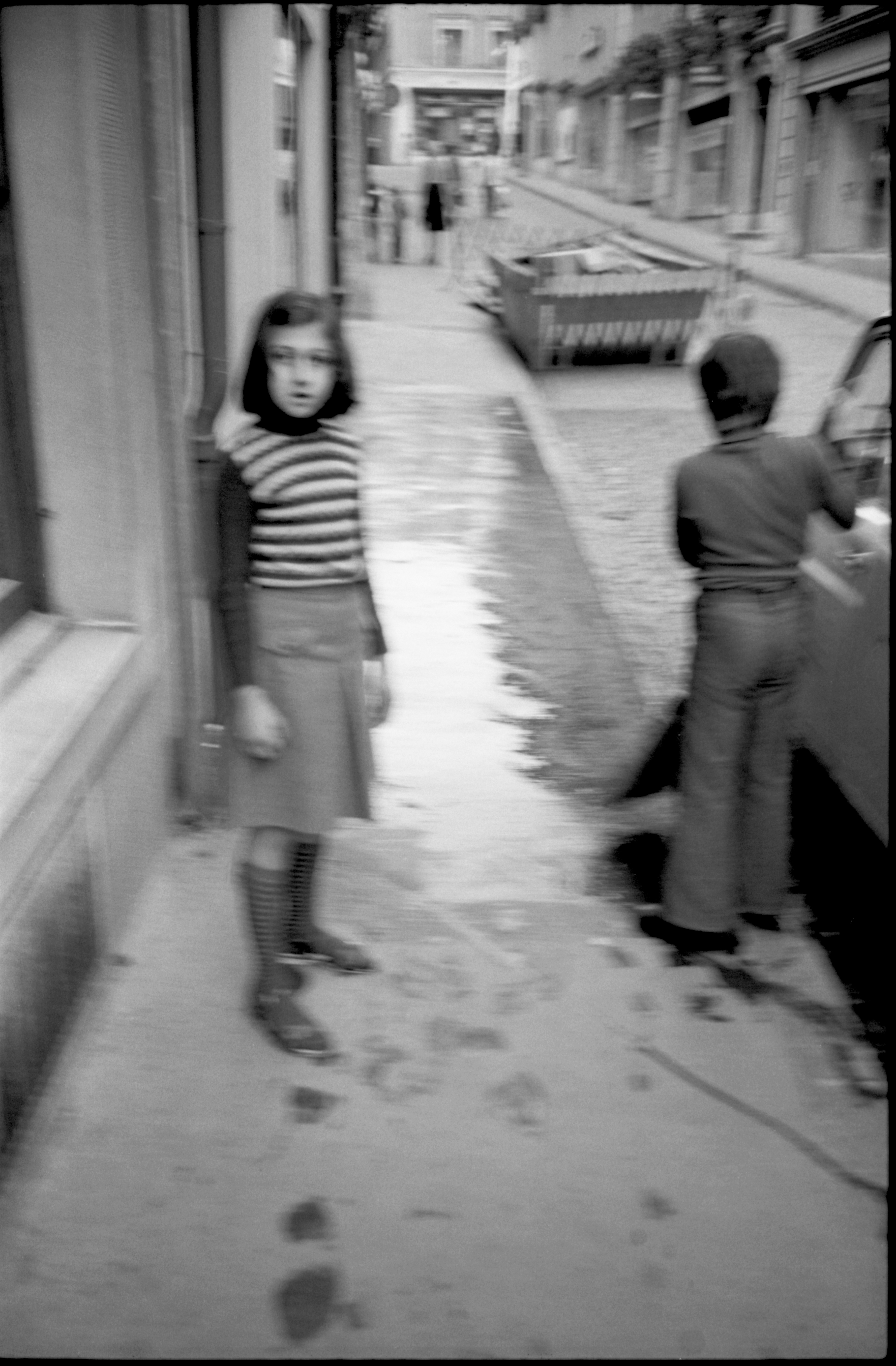 Children Playing on a Sidewalk