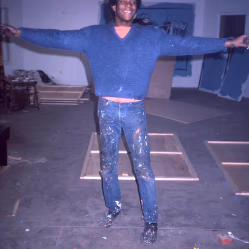 Jean Michel Basquiat in his first studio space, fall 1981.