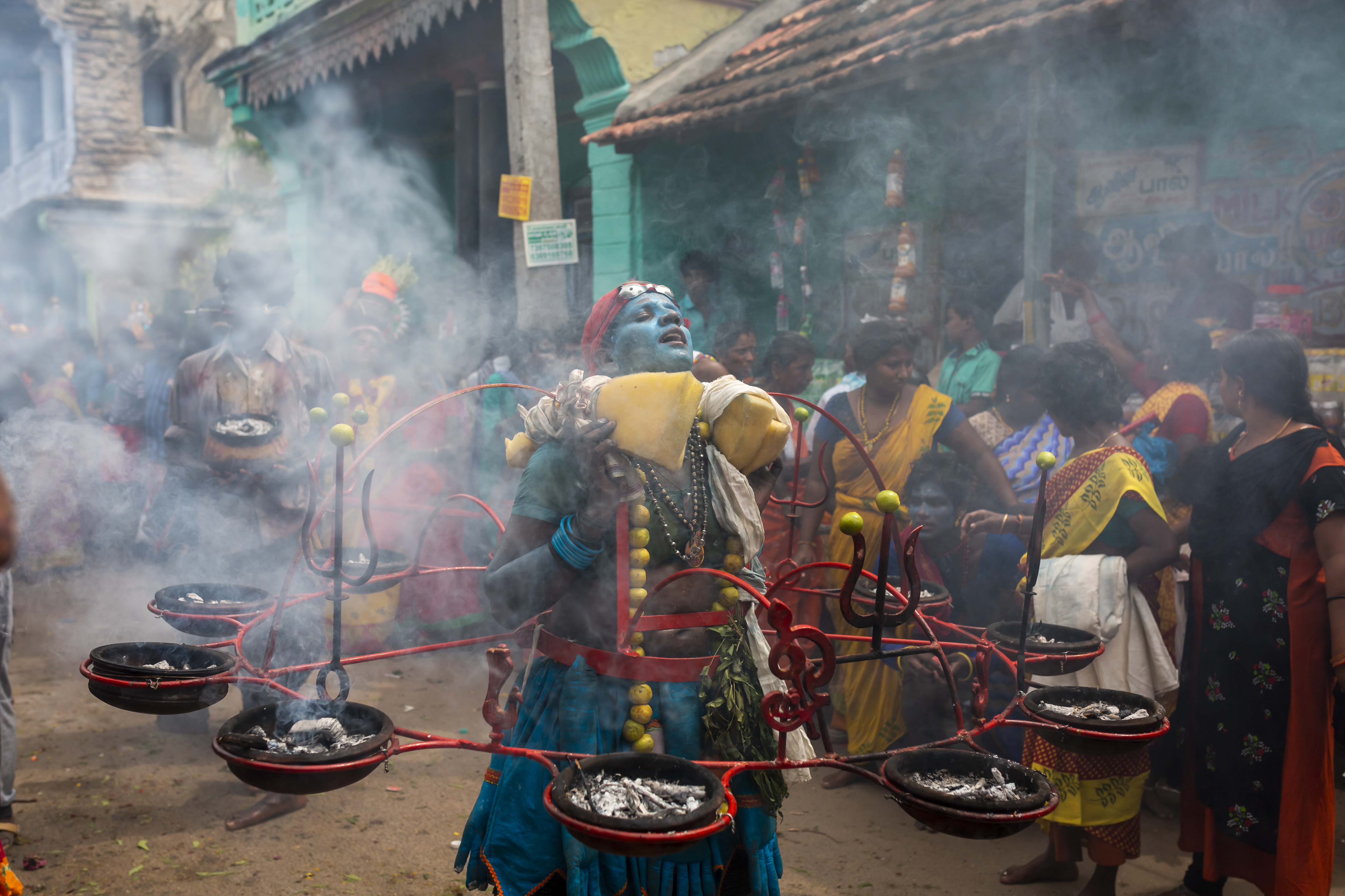 A Devotee with Fire Pots