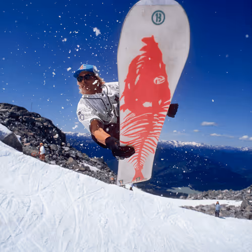 Jeff Brushie. Air to fakie on his trout base Burton Snowboards pro model in 1992