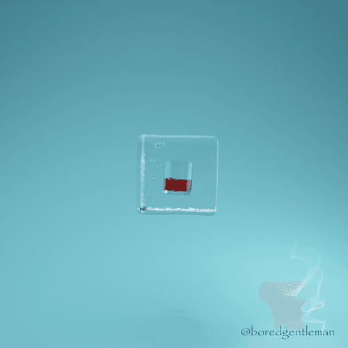Ice cube glass of whiskey