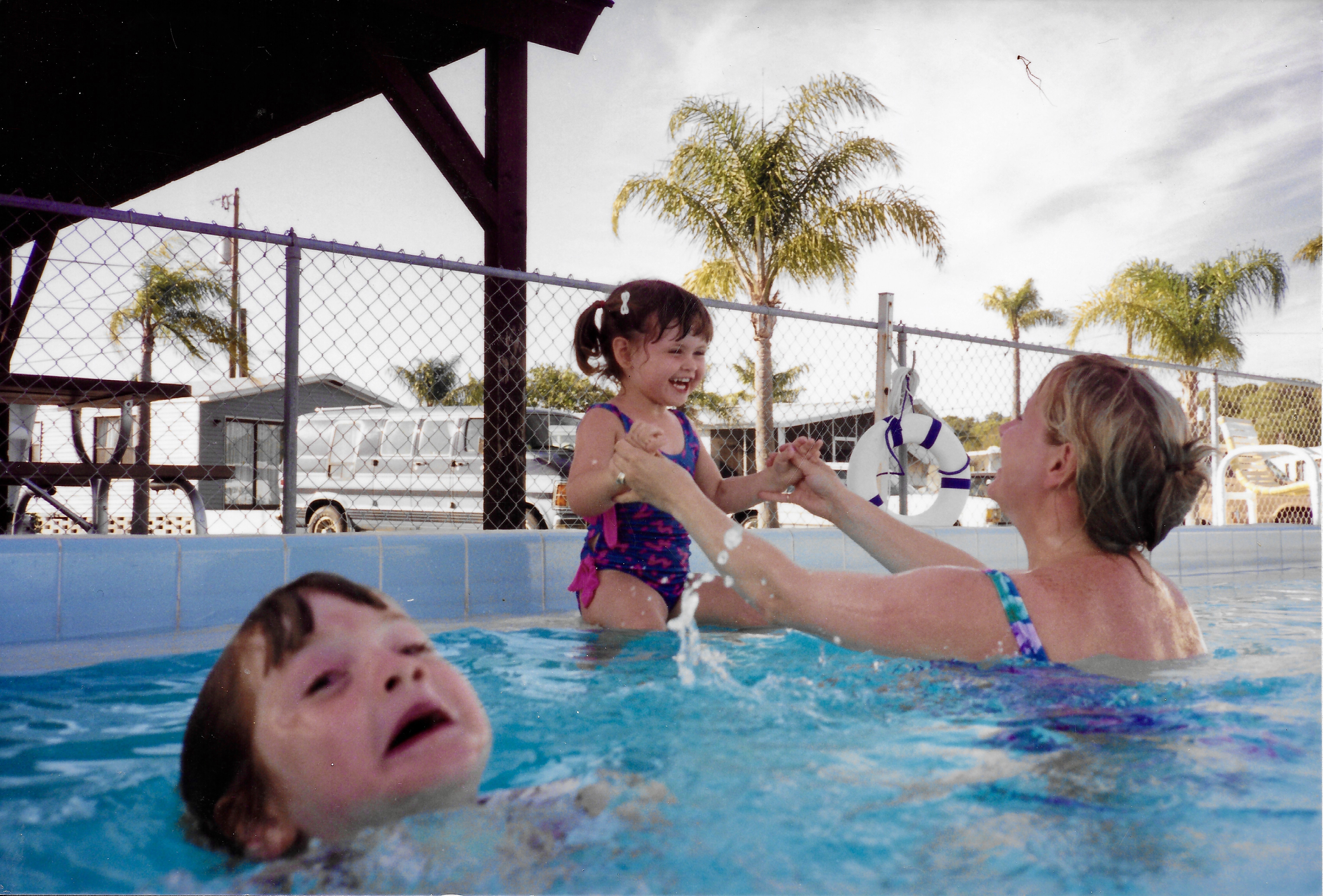 Mother Ignoring Kid Drowning In A Pool